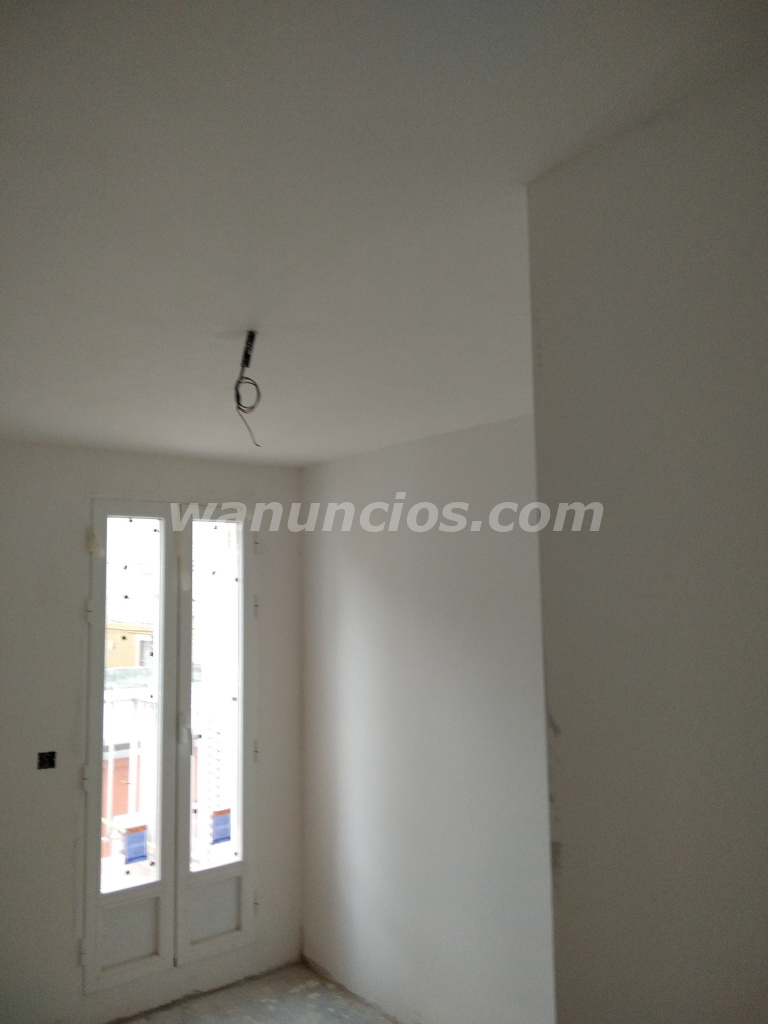 Yesero a mano alisados de aguaplast, enfoscados (Madrid) 2